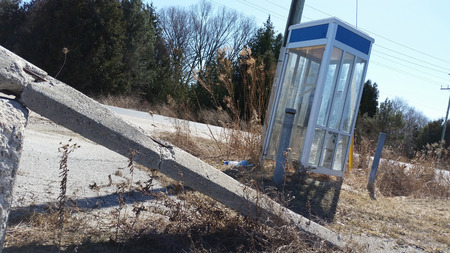 Forgotten Broken Roadside Telephone Boothの写真素材