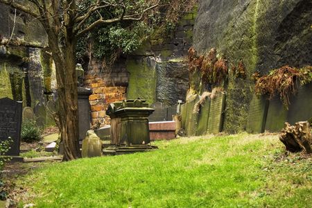 Row of very old tombstones in a cemeteryの写真素材