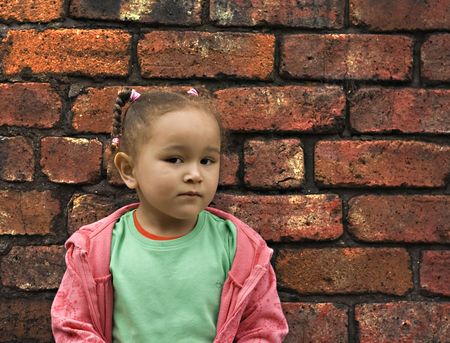 Young black  girl playing in an alleyの写真素材