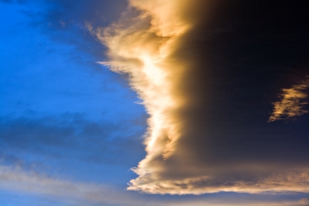 Dramatic storm clouds at sunsetの写真素材