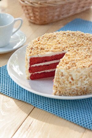 red velvet cake sliced with peanutの写真素材