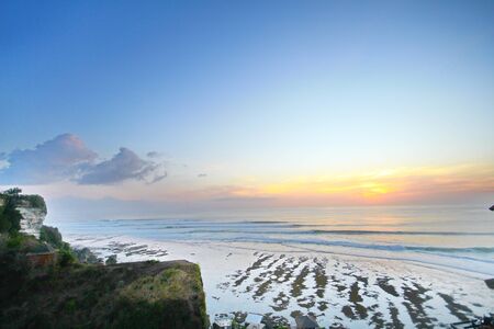 Beach Sunset over the beautiful Hillの写真素材