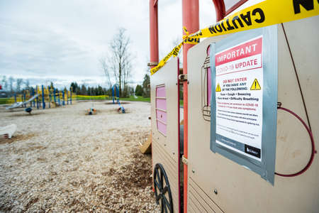 Surrey, Canada - Mar 29, 2020: Playground slide closed due to Covid-19 pandemicのeditorial素材