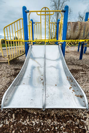 Surrey, Canada - Mar 29, 2020: Playground slide closed due to Covid-19 pandemic