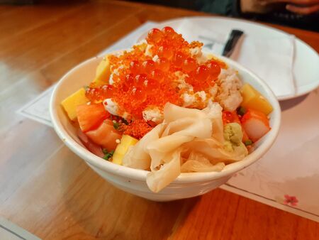 Japanese food topped with salmon roeの写真素材