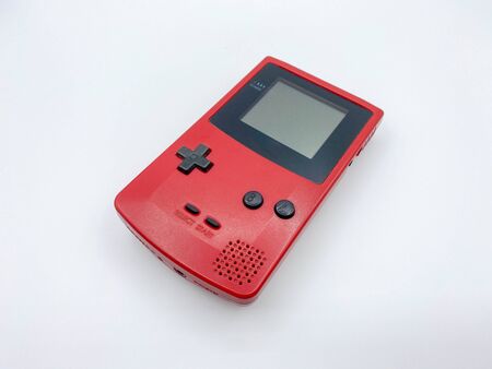 Retro Red Handheld game console.の写真素材