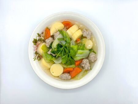 Clear Soup with Bean Curd and Minced Pork with white background.の写真素材