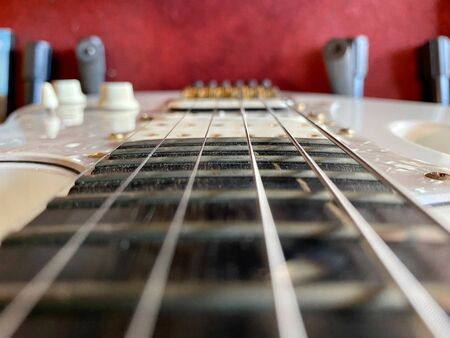 Close-up Stings and fret on electric guitar.の写真素材