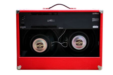 Isolated red vintage amplifier on white background with work path. back panel view.の写真素材