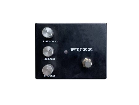 Isolated black vintage fuzz stomp box effect on white background with work path.の写真素材