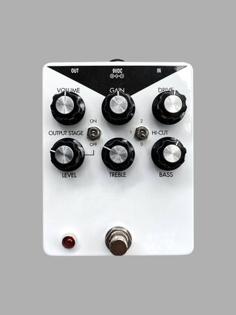 Isolated white boutique overdrive stomp box effect on grey background with work path.