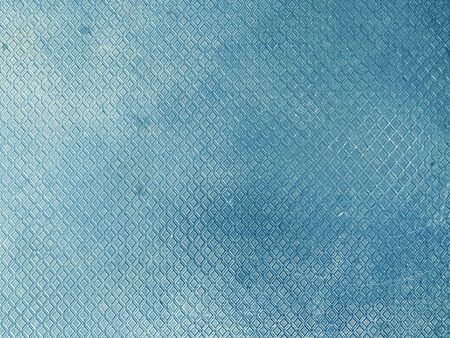 close up blue old rubber flooring that looks like polygon, arranged in a pattern Can be used as backdrop, copy space available. background or texture.の写真素材