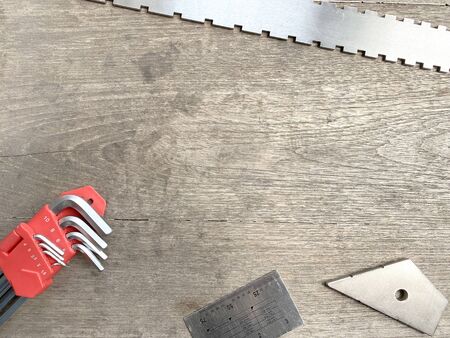 Tools repairing, guitar set up the tool Scale ruler Ruler. Industry business, Guitar repair shop, Carpentry jobs concept top view on brown wooden table mock-up with copy space.の写真素材