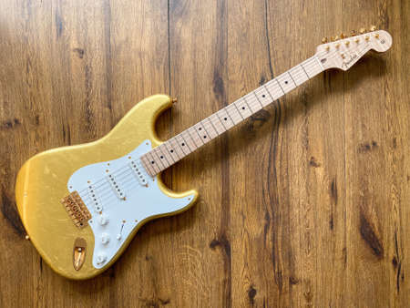 Bangkok, Thailand - June 10, 2020: Fender Master Built Eric Clapton Gold Leaf by Todd Krause The body is coated with 23k gold  Eric Clapton Is a guitar that has a long legendary story.のeditorial素材