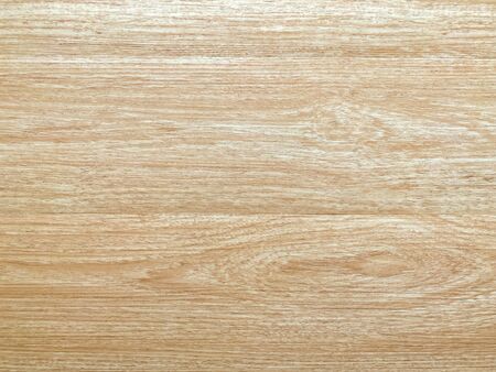 The light brown wooden floor looks clean. Can be used as a backdrop for product photography, decoration with copy space. wallpaper, background or texture.の写真素材
