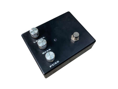 Isolated Black fuzz American vintage sound style stompbox electric guitar effect for studio and stage performed on white background with clipping path. side view photo. music concept.の写真素材