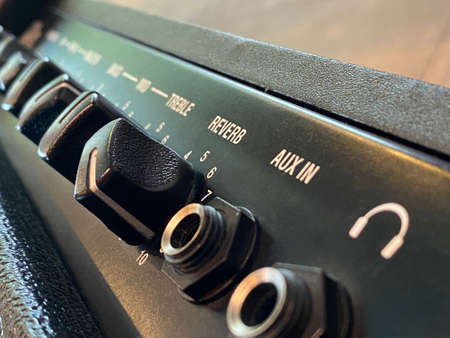 Close-up reverb and black knob of modern amplifier and control panel. clean and hi-gain distortion for rock to metal, Blues, and jazz genres. Music business concept.の写真素材