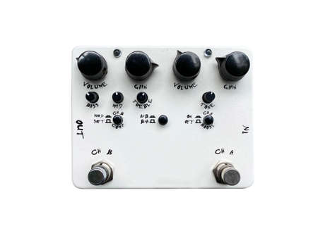 Isolated white overdrive dual-channel stompbox electric guitar effect for studio and stage performed on white background. music concept.の写真素材
