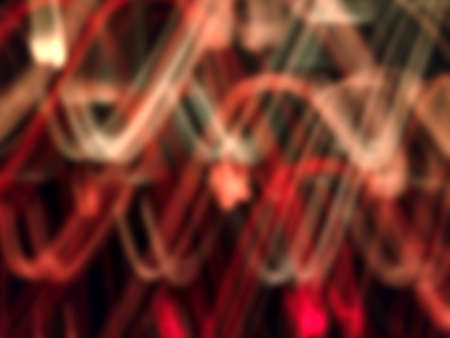 defocused Red neon lighting len flare background in low shutter speed condition can use for overlay, texture and background in graphic design. technology concept.の写真素材