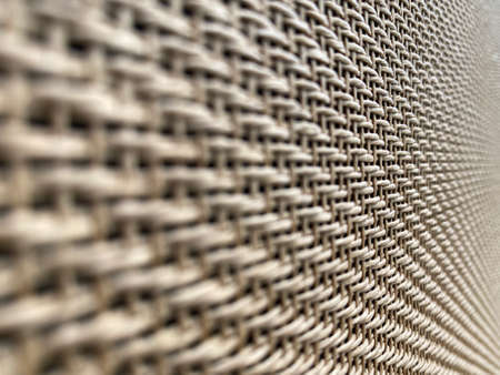 close up selective focus on middle brown cream speaker grill look Like woven bamboo with Blur the edges can use for background, backdrop and texture with copy space for letter. Side view angle.の写真素材