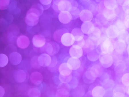 Abstract colorful white light to purple bokeh gradient effect texture on black background. glitter modern lights defocused look luxury and elegant for celebrating or cosmetic products.の写真素材