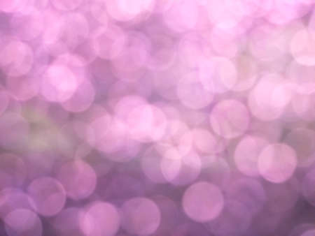 Abstract colorful white light to pink bokeh gradient effect texture on black background. glitter...