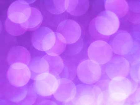 Abstract colorful white light to pink bokeh gradient effect texture on black background. glitter modern lights defocused look luxury and elegant for celebrating or cosmetic products.の写真素材