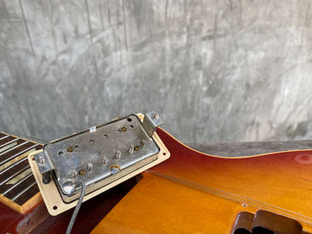 humbucking pick up of electric guitar that is removed inside the guitar body, in case it is repaired, can be used as a preview in advertising or repair work for the guitar service store.の写真素材
