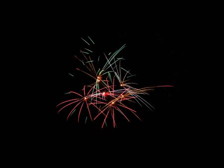 Sparkle fireworks in night sky on Fourth of July Independence day holiday United State of America. Celebration of fun and freedom with sparklers and sparkles.の写真素材
