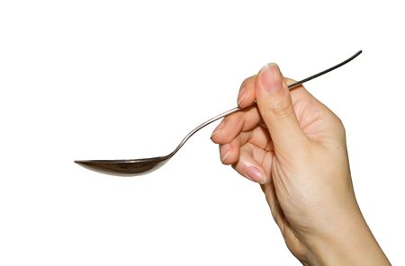 Hand with spoonの写真素材