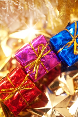 colorful gift boxes with decoration in goldの写真素材