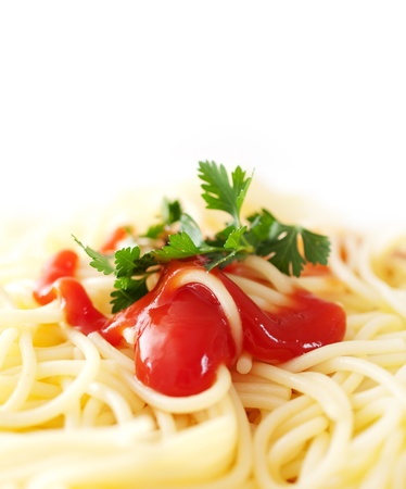 spaghetti with ketchup and parsley の写真素材