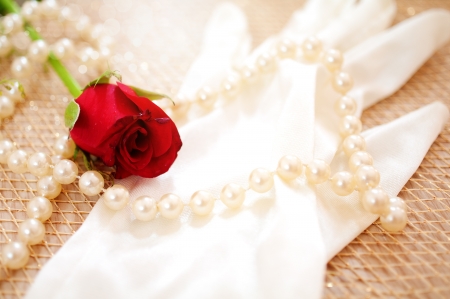 rose and pearls with vintage glove の写真素材