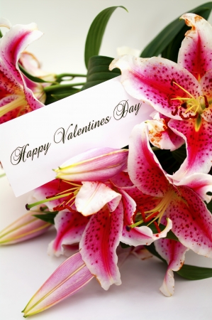 happy valentines day greeting card with lilium flowersの写真素材