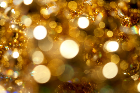  abstract background with golden bokeh lightsの写真素材