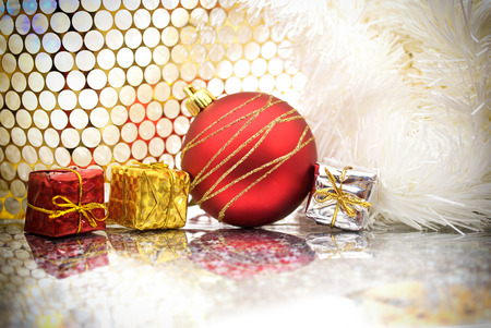 christmas background with bauble and gift packagesの写真素材