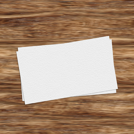 Business card template on wooden tableの写真素材