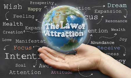 Holding the World with The Law of Attractionの写真素材