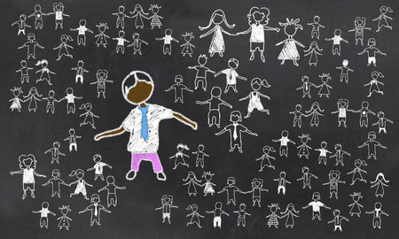 Standing Out from the Rest on Blackboardの写真素材