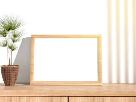 A framed canvas on the table, next to a vase with a plant. Bright beams of light illuminate the...