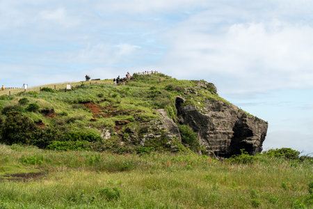 Udo (Cow Island), Jeju island, South Korea - Jun. 06, 2023: Beautiful Udobong peak (Udo mountain) beside Jeju do (Jeju island).のeditorial素材