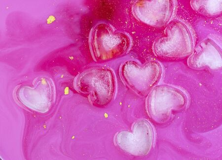Pink abstract background of ice hearts. Love concept, modern style. Romantic card with frozen heart. Symbol of Valentine day. Cool texture, pattern. Laconic art design.の写真素材
