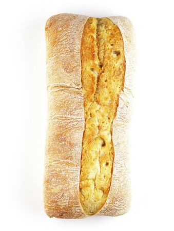 rectangular loaf of bread isolated on a white background, top view. baguette of whole and cut breadの写真素材