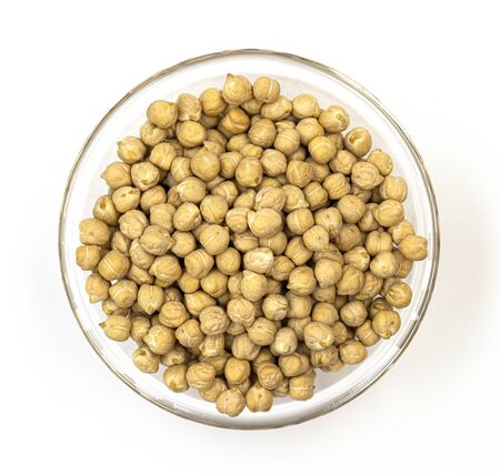 raw chickpeas Turkish lamb peas in a white bowl on a white background. dietary culinary product for women's health. proper nutrition for childrenの写真素材
