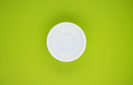 biodegradable food containers on a green background, space for text. caring for nature. reducing environmental pollution. refusal of plastic dishesの写真素材