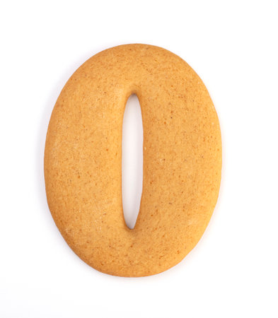 Gingerbread number zero on a white background. Christmas new year's treat cookiesの写真素材