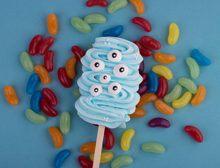 Creepy fun monsters made of sweet meringue for a Halloween party. idea background for halloweenの写真素材