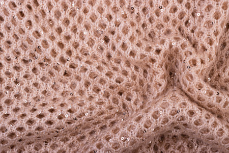 crumpled mesh wool scarf texture close-up for background. abstract woven backgroundの写真素材