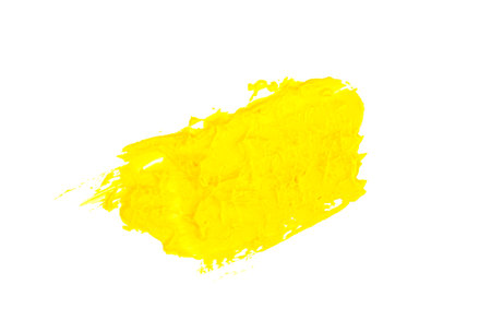 Illuminating  2021 yellow smear of oil paint on a white background. traces of yellow paintの写真素材