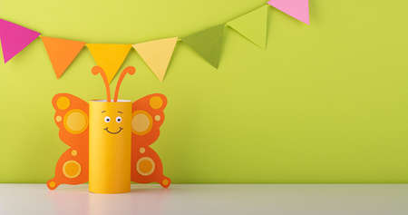 butterfly made of paper. the toys are made from a roll of toilet paper. eco-friendly product. recyclingの写真素材